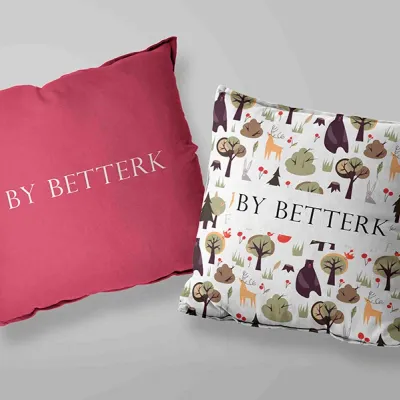 หมอนอิงสกรีนโลโก้ BY BETTERK สีชมพูและลายพิมพ์