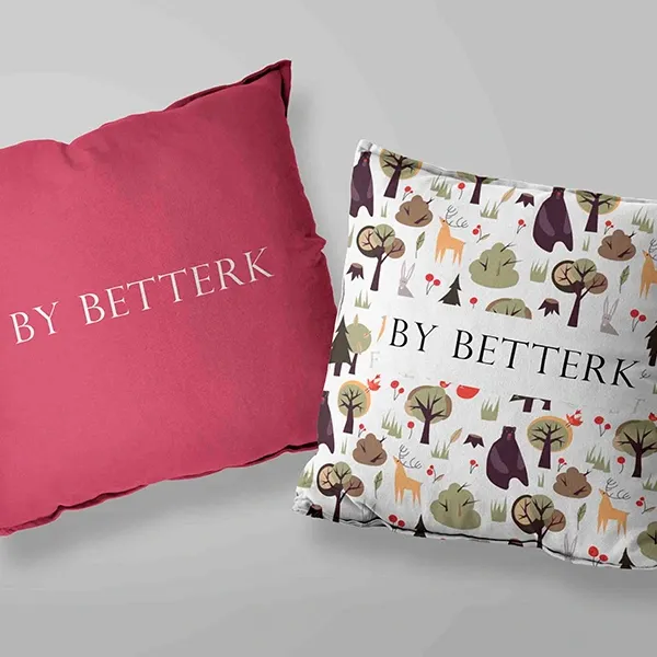 หมอนอิงสกรีนโลโก้ BY BETTERK สีชมพูและลายพิมพ์